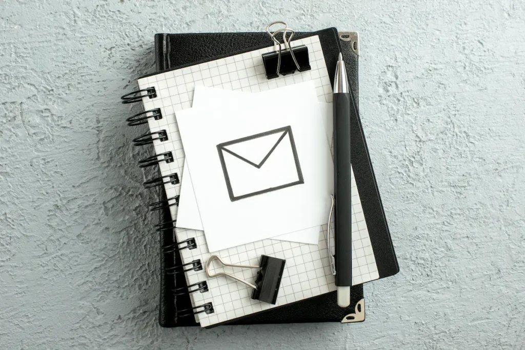 email symbol on a notebook
